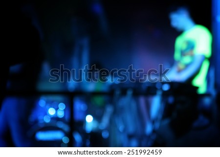 blurred photo background, music band, might club concert, horizontal orientation