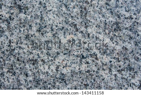 The gray granite rock texture background