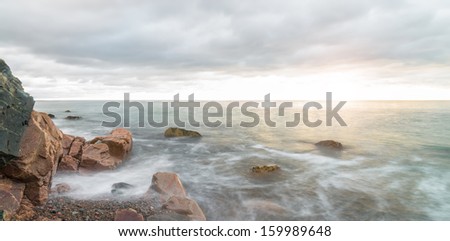 Panorama of ocean waves at sunrise - Long-exposure (Cape Breton, Nova Scotia, Canada)