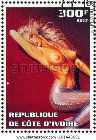 IVORY COAST CIRCA 2003: stamp printed by Ivory Coast, shows sexy woman, circa 2003