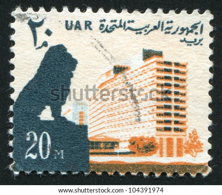 EGYPT - CIRCA 1964: stamp printed by Egypt, shows Lion and Nile Hilton Hotel, circa 1964