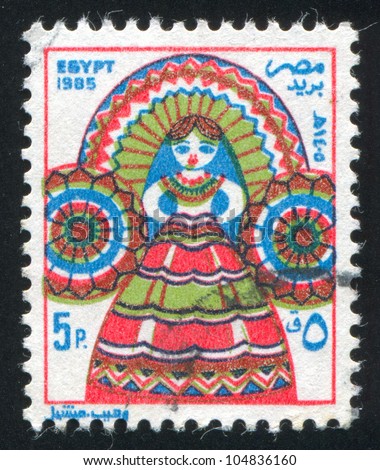 EGYPT - CIRCA 1985: A stamp printed by Egypt, shows Folk Doll, circa 1985