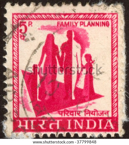 INDIA - CIRCA 1961: The Indian stamp. Family walk. Mother, the father, the son and the daughter, circa 1961.