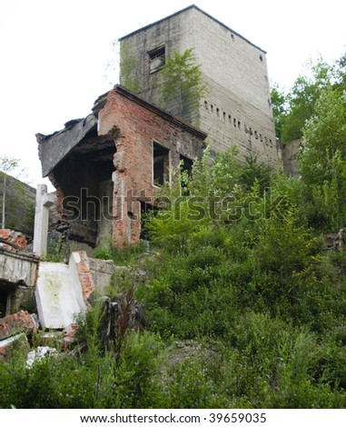 The old destroyed city building. The destroyed and thrown house.