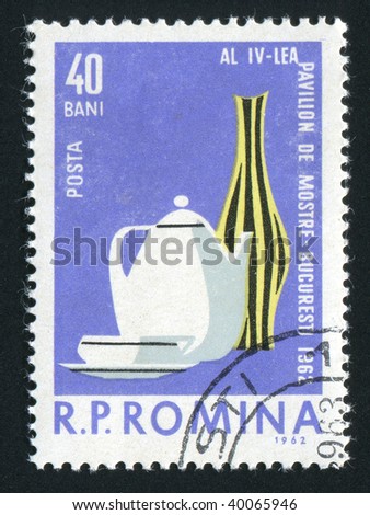 ROMANIA - CIRCA 1962: The ceramic ware is on a table, circa 1962.