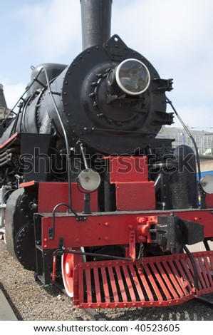 High resolution image. Vintage steam locomotive. Ancient train with a steam locomotive.