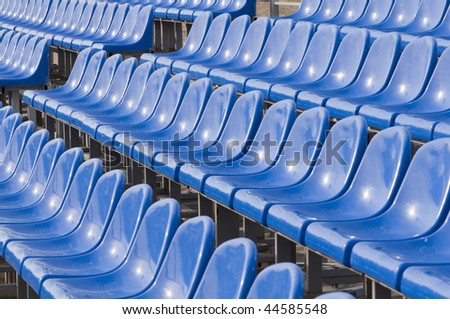Dark blue armchairs at stadium. The tool of struggle of fans.