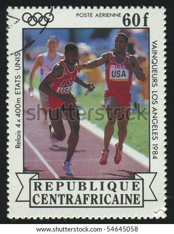 CENTRAL AFRICAN REPUBLIC - CIRCA 1984:   stamp printed by Central African Republic, shows running athletes at the stadium, circa 1984.
