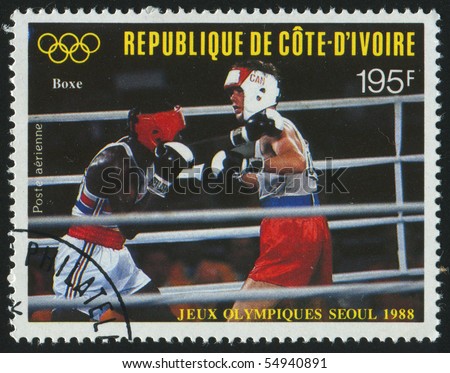 IVORY COAST - CIRCA 1988: stamp printed by Ivory Coast, shows boxer, circa 1988.
