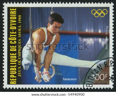 IVORY COAST - CIRCA 1988: stamp printed by Ivory Coast, shows gymnast, circa 1988.