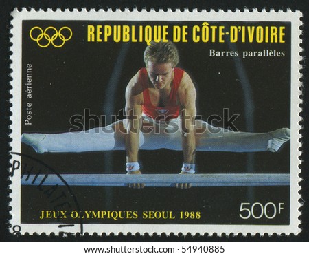 IVORY COAST - CIRCA 1988: stamp printed by Ivory Coast, shows gymnast, circa 1988.