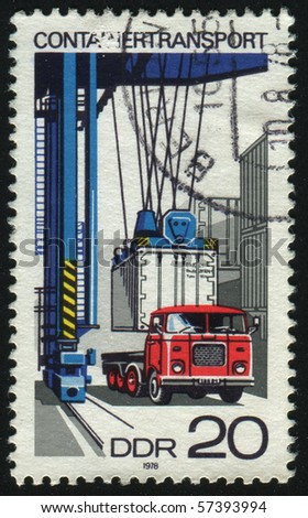 GERMANY- CIRCA 1978: stamp printed in Germany, shows Loading container on flatbed truck, circa 1978.