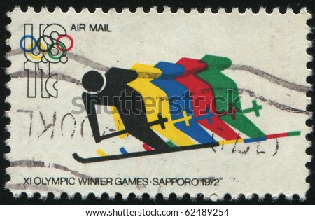 UNITED STATES - CIRCA 1972: stamp printed by United states, shows Skiing and Olympic Rings, circa 1972.