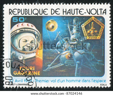 BURKINA FASO CIRCA 1978: stamp printed by Burkina Faso, shows Yuri Gagarin and moon landing, circa 1978