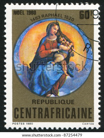 CENTRAL AFRICAN REPUBLIC 1980: A stamp printed by Central African Republic, shows Virgin and Child, by Raphael, circa 1980