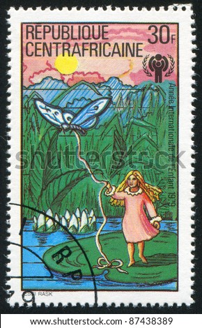 CENTRAL AFRICAN REPUBLIC 1979: stamp printed by Central African Republic, shows Butterfly and girl, circa 1979