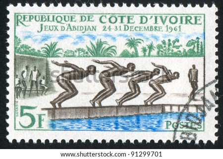 IVORY COAST CIRCA 1961: stamp printed by Ivory Coast, shows Swimming Race, circa 1961