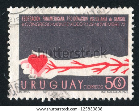 URUGUAY - CIRCA 1973: stamp printed by Uruguay, shows Arm with Arteries and Heart, circa 1973