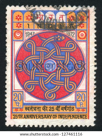 INDIA CIRCA 1973 stamp printed by India shows Wheel of Asoka Naga Serpent circa 1973 INDIA CIRCA 1973 stamp printed by India shows Wheel of Asoka Naga Serpent circa 1973