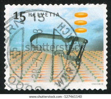 SWITZERLAND - CIRCA 2003: stamp printed by Switzerland, shows Rex potato peeler designed by Alfred Neweczeral, circa 2003
