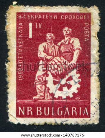 BULGARIA - CIRCA 1959: stamp printed by Bulgaria, shows Worker and peasant with cogwheel, circa 1959