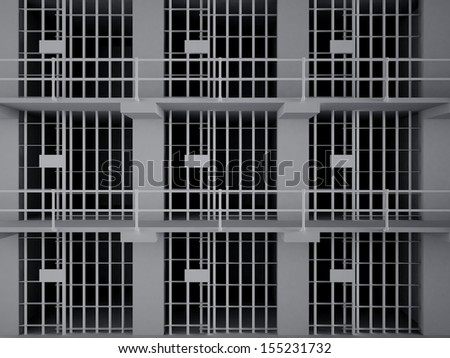 The view from the inside of a brick jail cell with iron bars.