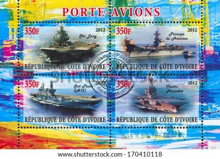 IVORY COAST CIRCA 2012: stamp printed by Ivory Coast, shows aircraft carrier, circa 2012