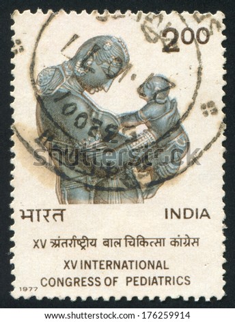 INDIA - CIRCA 1977: stamp printed by India, shows Mother and Child, Khajuraho Sculpture, circa 1977