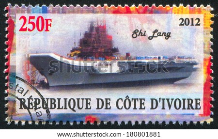 IVORY COAST CIRCA 2012: stamp printed by Ivory Coast, shows aircraft carrier, circa 2012