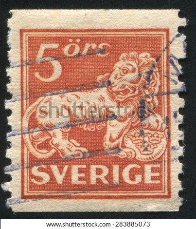 SWEDEN - CIRCA 1921: stamp printed by Sweden, shows Heraldic lion supporting arms of Sweden, circa 1921
