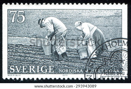 SWEDEN - CIRCA 1973: stamp printed by Sweden, shows Farm couple planting potatoes, circa 1973