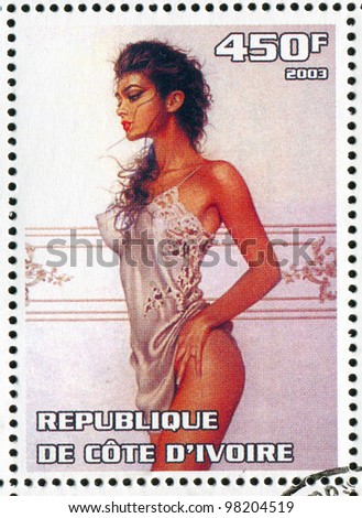 IVORY COAST - CIRCA 2003:A stamp printed by Ivory Coast, shows sexy woman, circa 2003