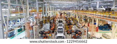 welding of car body. Automotive production line. long format. Wide frame