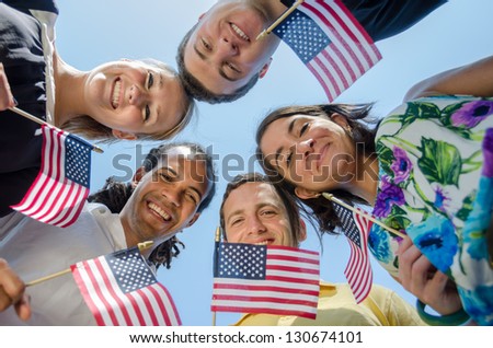 Patriotic Young Adults With Flags