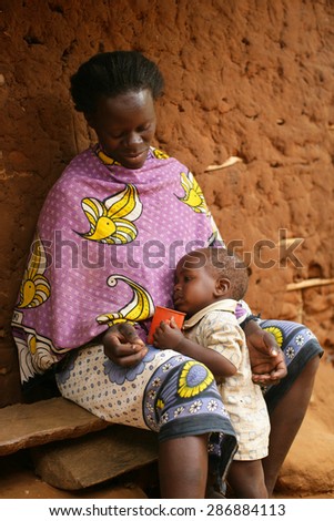 Kenya 2015 Year January 28. African mother and baby in african village
