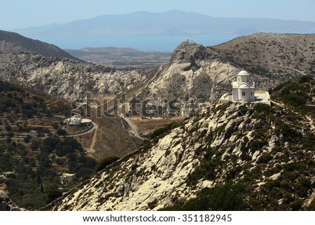 Majestick view on mountains, white ortodox greek church on the top of mountain/ mountain greek landscape with church/ tourism,excursion,travel