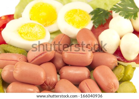 Mini hot dogs, boiled eggs and baby mozzarella