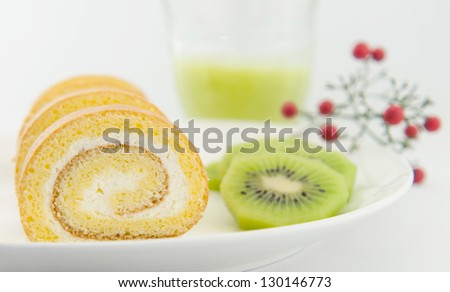 handmade cake rolls and fresh kiwi for afternoon tea