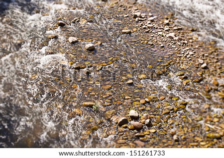 image of stones and water as background