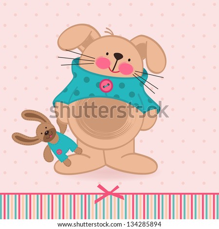 rabbit with a toy rabbit with a toy