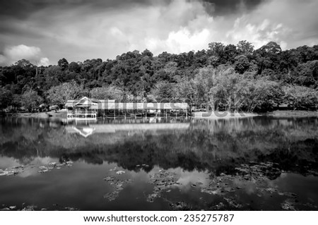 Mirror reflection of a nature landscape in black and white