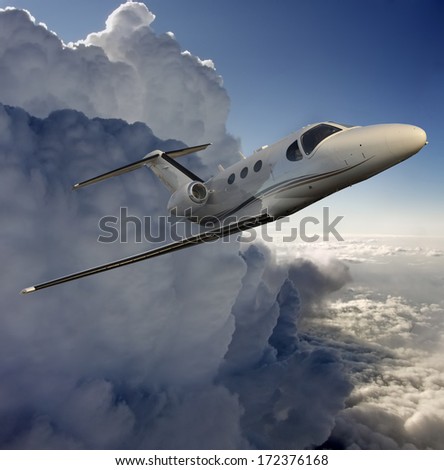 Executive plane flying away from a storm