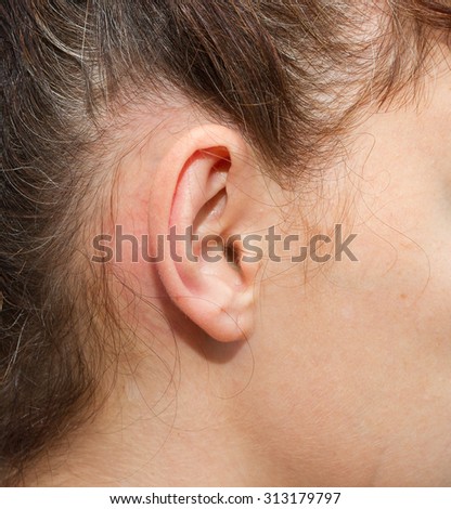 Women\'s right ear, the auricle. Kind of close up.