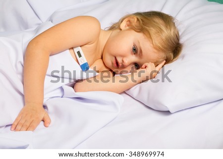 Sick little girl in bed.Virus, flu, cold, fever.