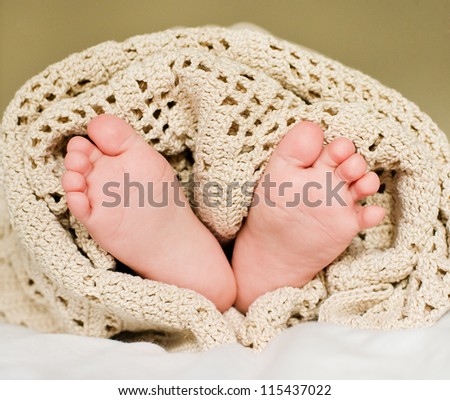 Baby with cute small foot