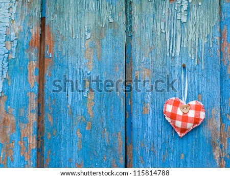 Wonderful heart on blue woody background