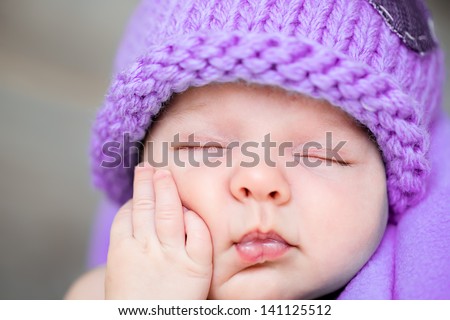 The Sweet Dream Of Newborn In Purple Hat