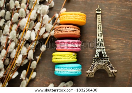 Traditional french colorful macaroons wuth the symbol of Paris