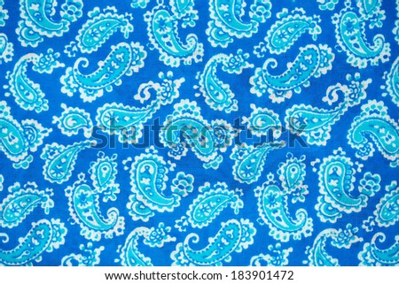 Blue with light blue ornament piece of fabric as texture for photo background