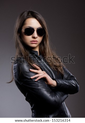 Attractive woman with leather jacket